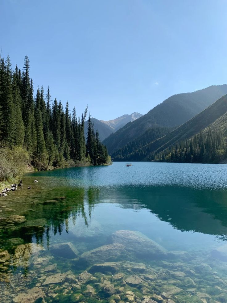 Turquoise Kolsai Lakes surrounded by forest